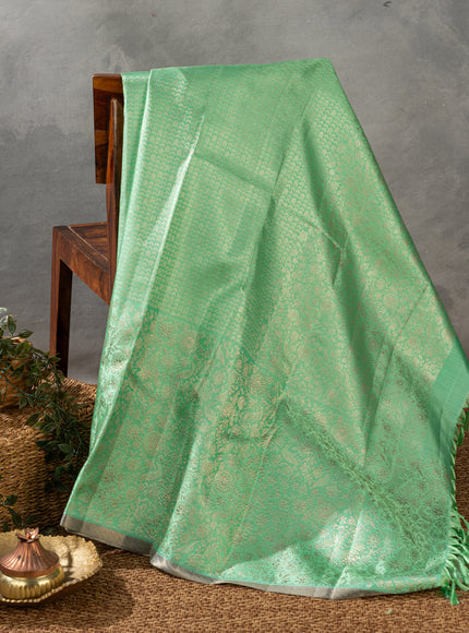 Teal Kanchipuram Silk Saree With Silver Zari Weaves