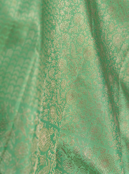Teal Kanchipuram Silk Saree With Silver Zari Weaves