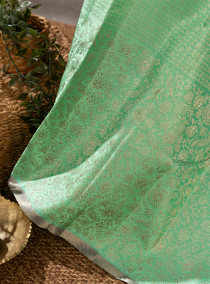 Teal Kanchipuram Silk Saree With Silver Zari Weaves