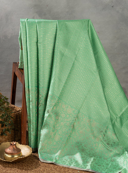Teal Kanchipuram Silk Saree With Silver Zari Weaves