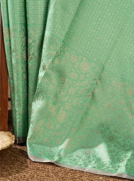 Teal Kanchipuram Silk Saree With Silver Zari Weaves