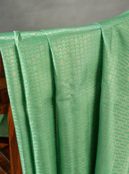 Teal Kanchipuram Silk Saree With Silver Zari Weaves