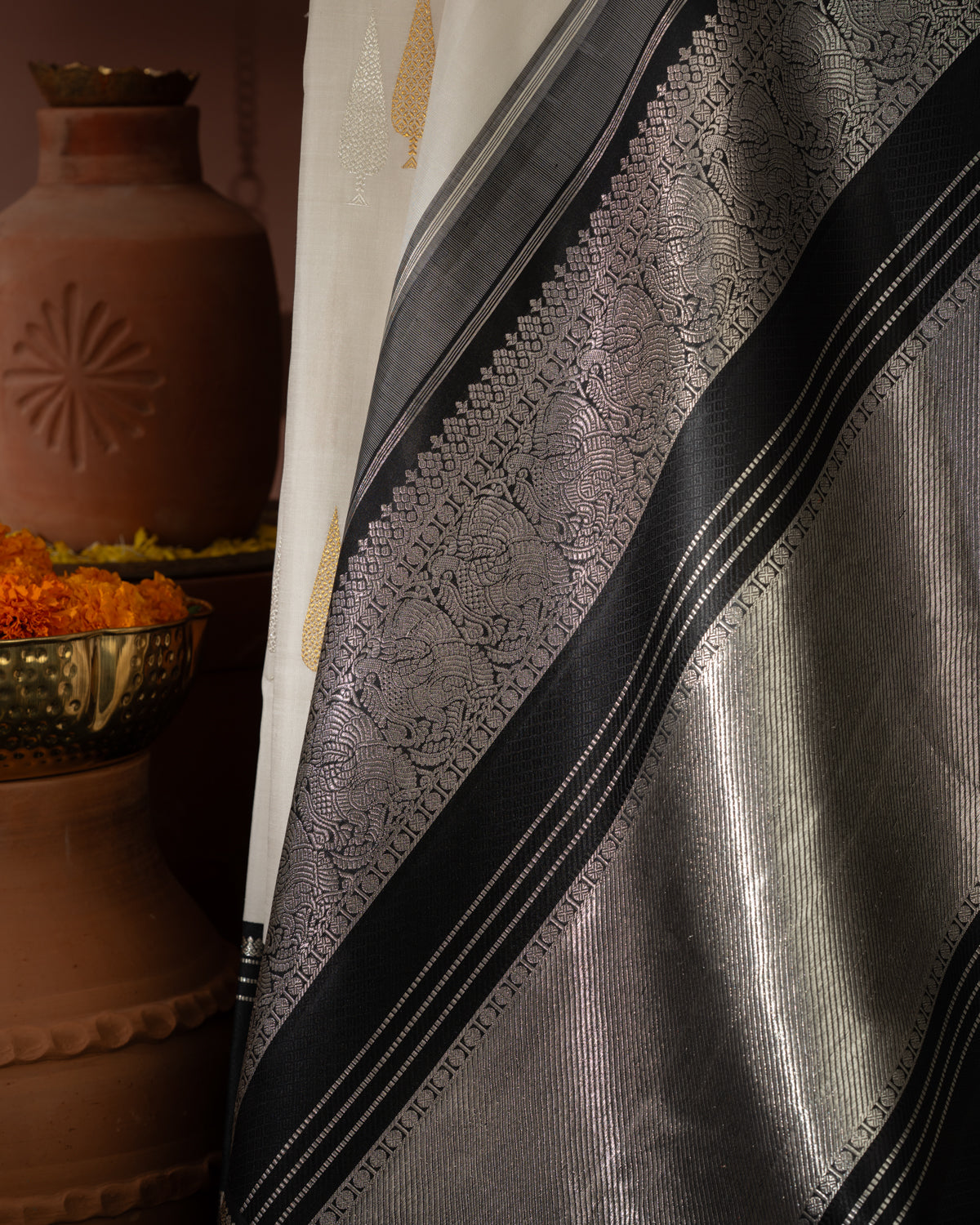 Off White & Majestic Black Kanchipuram Silk Saree With Silver & Gold Zari Buttas