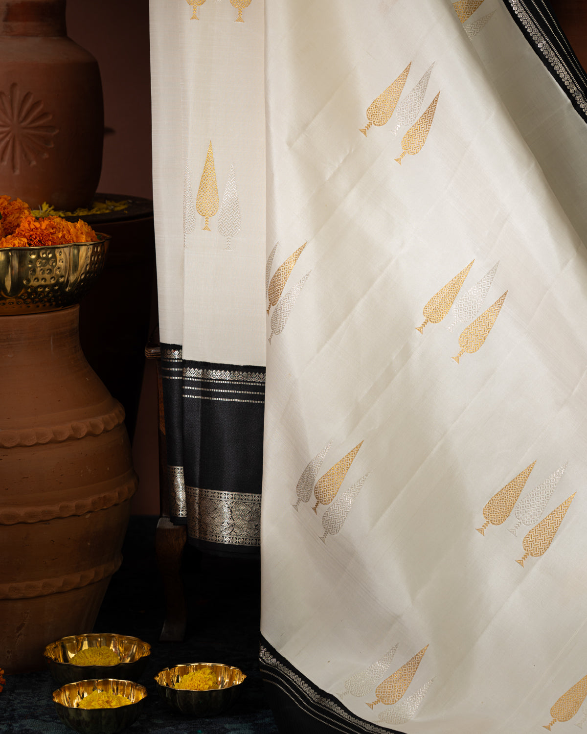 Off White & Majestic Black Kanchipuram Silk Saree With Silver & Gold Zari Buttas