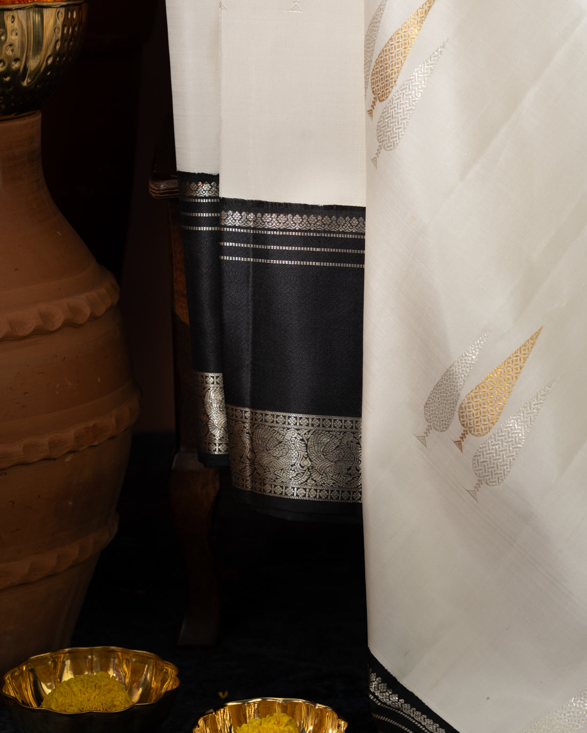 Off White & Majestic Black Kanchipuram Silk Saree With Silver & Gold Zari Buttas