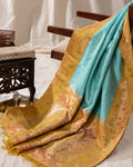 Light Blue Kanchipuram Silk Saree With Silver Brocade In Contrast Yellow Border