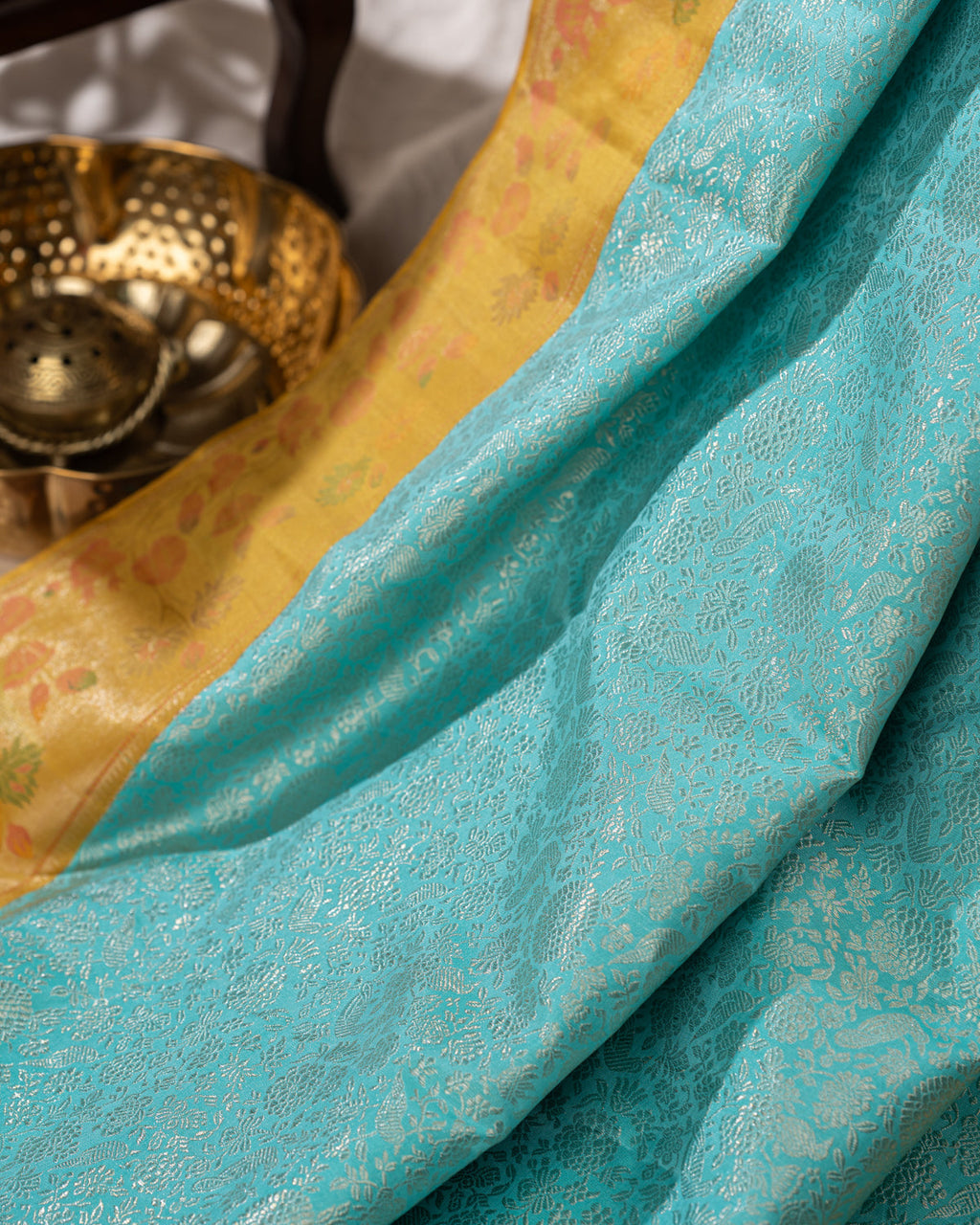 Light Blue Kanchipuram Silk Saree With Silver Brocade In Contrast Yellow Border