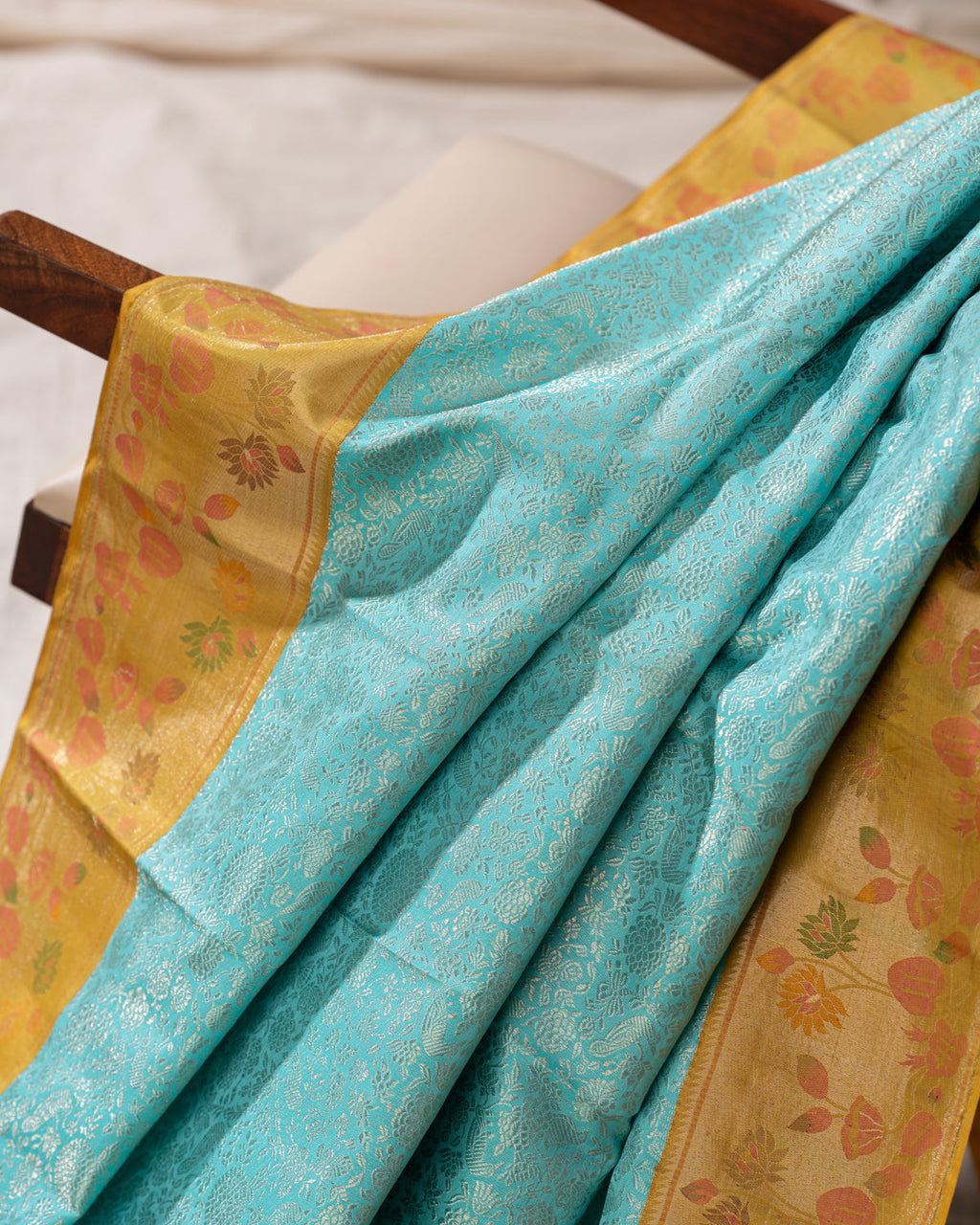 Light Blue Kanchipuram Silk Saree With Silver Brocade In Contrast Yellow Border