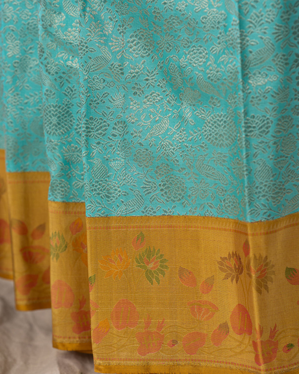 Light Blue Kanchipuram Silk Saree With Silver Brocade In Contrast Yellow Border