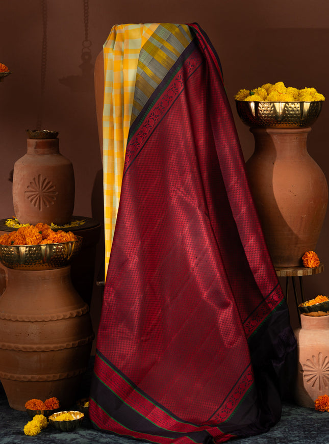Yellow Kanchipuram Silk Saree With Different Colored Checks In The Body