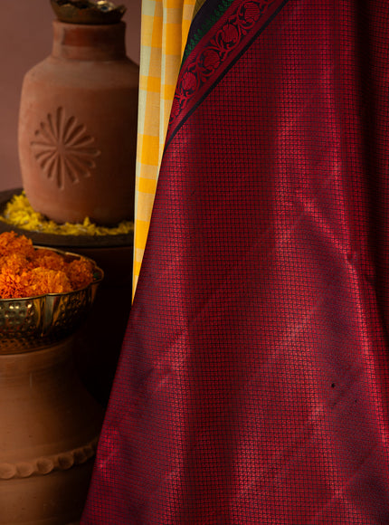 Yellow Kanchipuram Silk Saree With Different Colored Checks In The Body