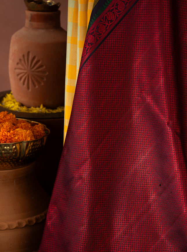 Yellow Kanchipuram Silk Saree With Different Colored Checks In The Body