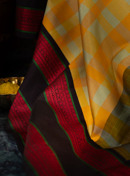 Yellow Kanchipuram Silk Saree With Different Colored Checks In The Body