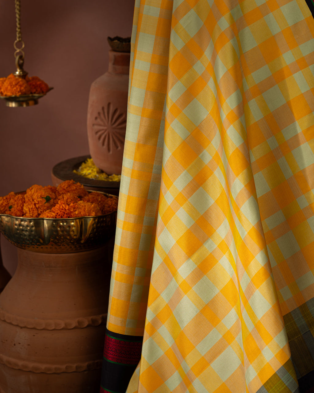 Yellow Kanchipuram Silk Saree With Different Colored Checks In The Body