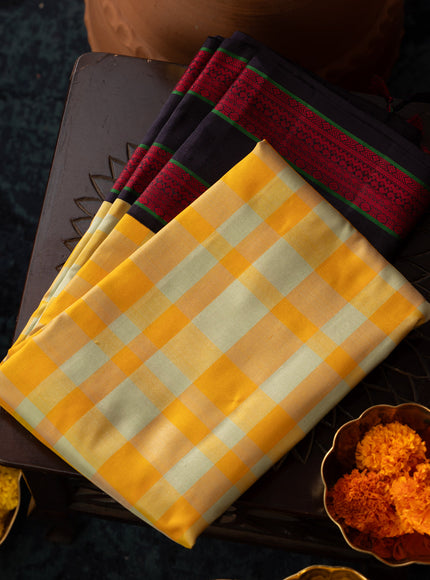 Yellow Kanchipuram Silk Saree With Different Colored Checks In The Body