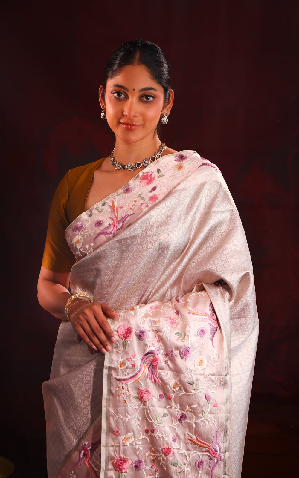 Mauve Tissue Kanchipuram With Rich Parsi Embroidery And Allover Brocade Weaving
