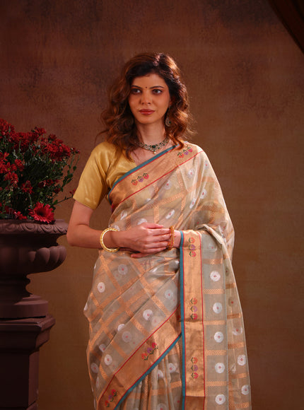 Pastel Green Zari Kota Saree With Zari Checks & Silver Butta