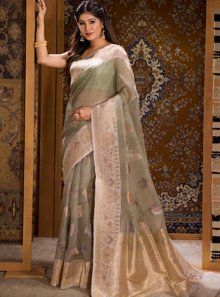 Pastel Green Banarasi Kora Saree With Zari Butta