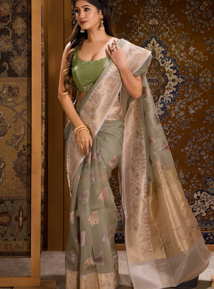 Pastel Green Banarasi Kora Saree With Zari Butta