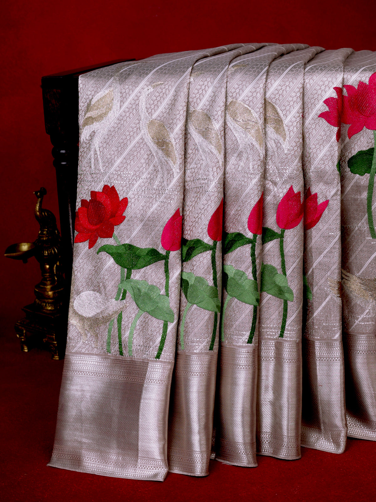 Tissue Kanchipuram Silk Saree With Allover Embroidery And Silver Zari