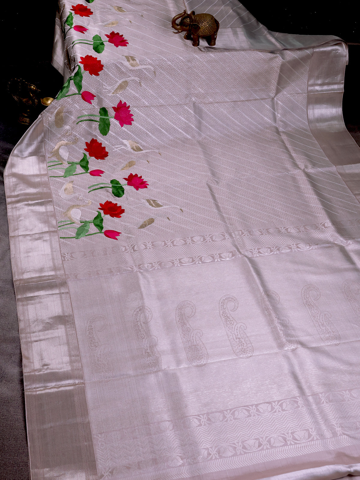Tissue Kanchipuram Silk Saree With Allover Embroidery And Silver Zari