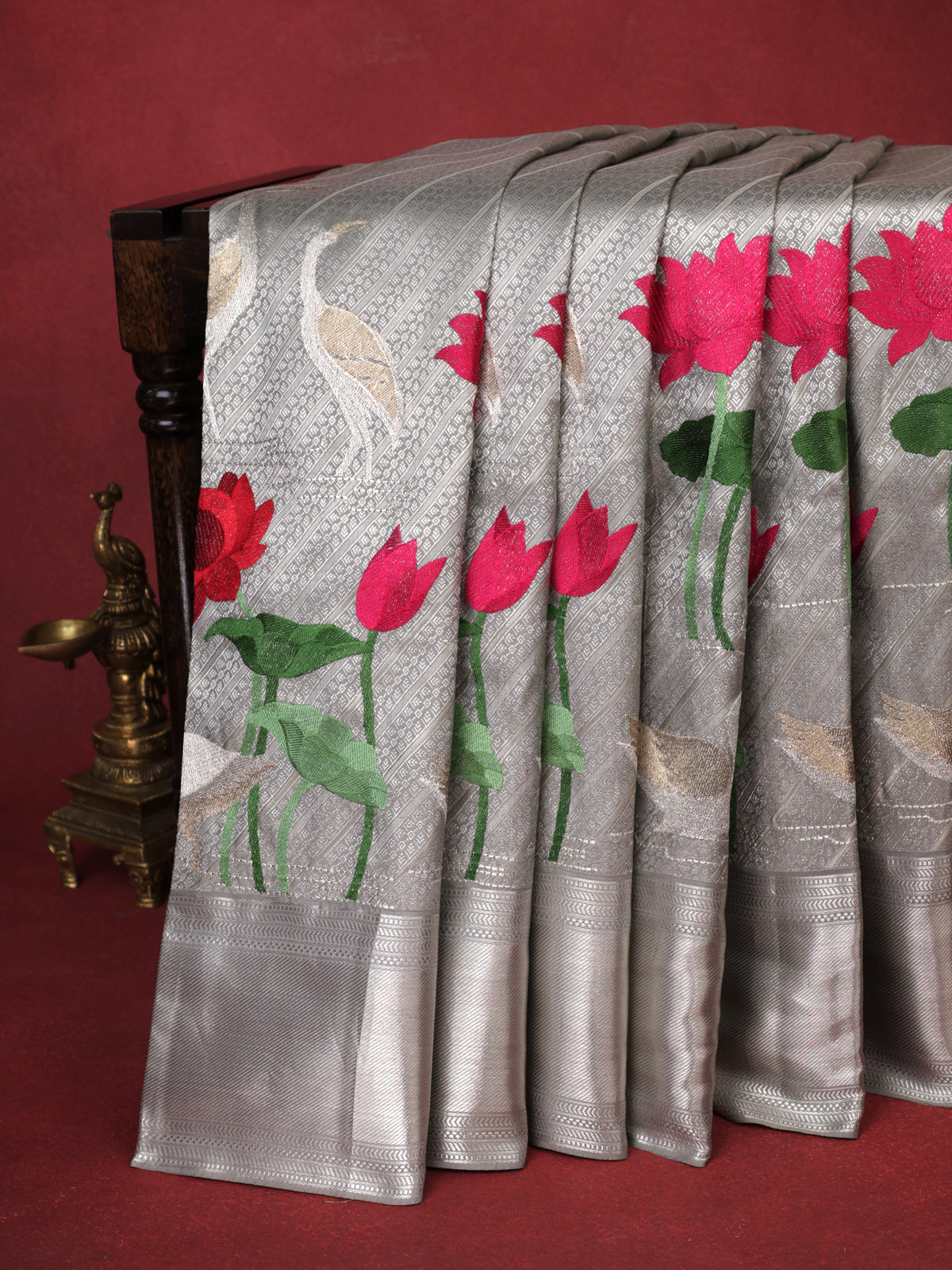 Tissue Kanchipuram Silk Saree With Allover Embroidery And Silver Zari