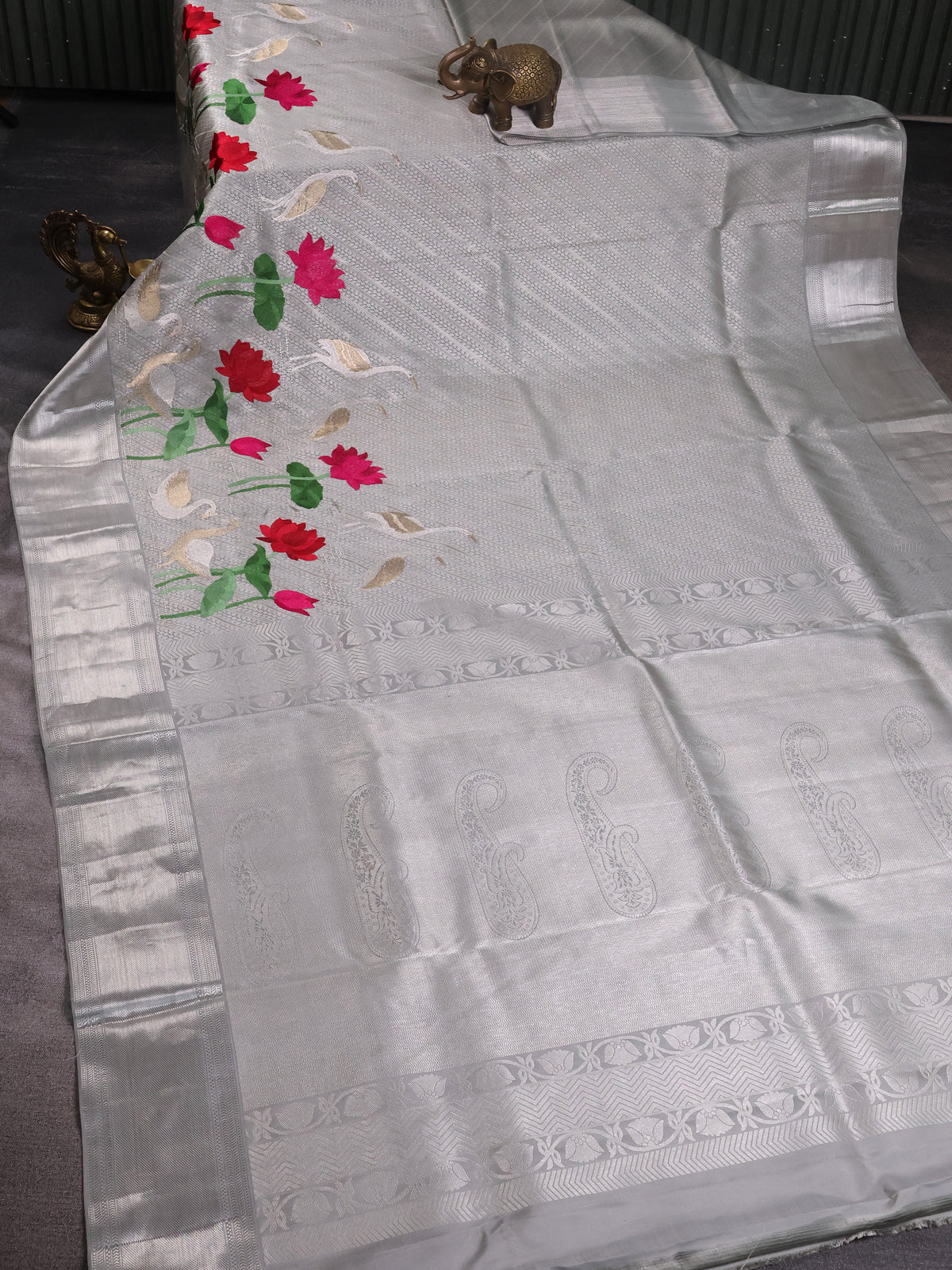 Tissue Kanchipuram Silk Saree With Allover Embroidery And Silver Zari