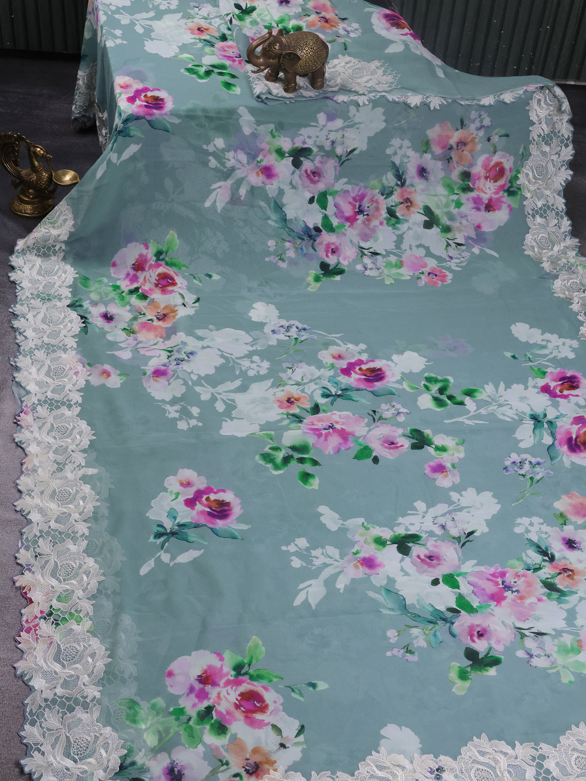 Pastel Blue Georgette Saree With Scalap And Lace Type Embroidery