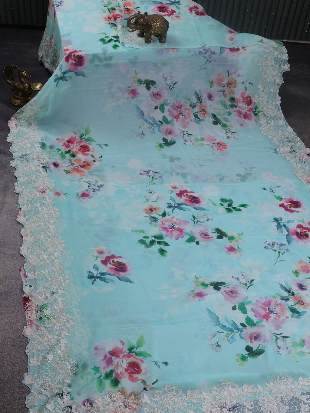 Aqua Blue Georgette Saree With Scalap And Lace Type Embroidery