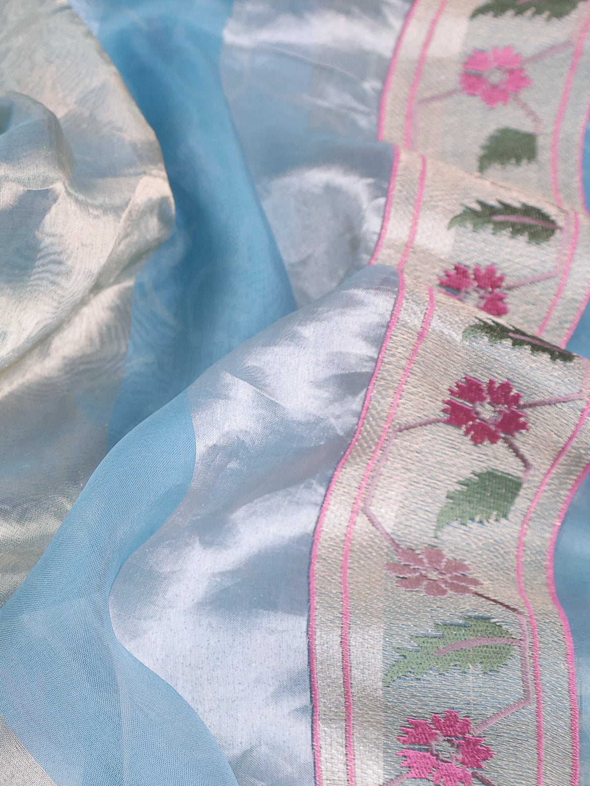 Pastel Blue Organza Silk Saree With Floral Embroidery Border