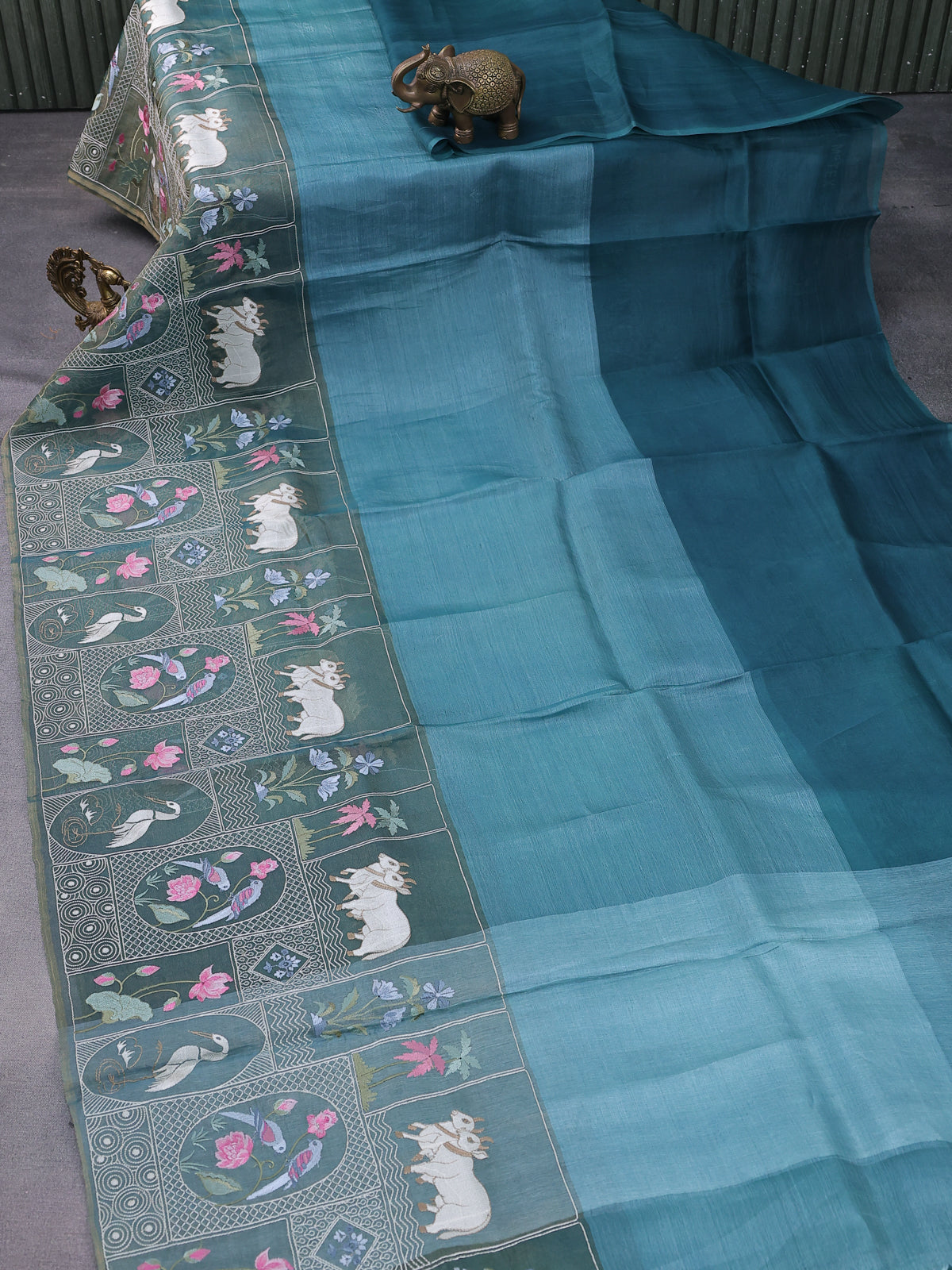 Peacock Blue Pure Organza Silk Saree With Long Embroidery Border