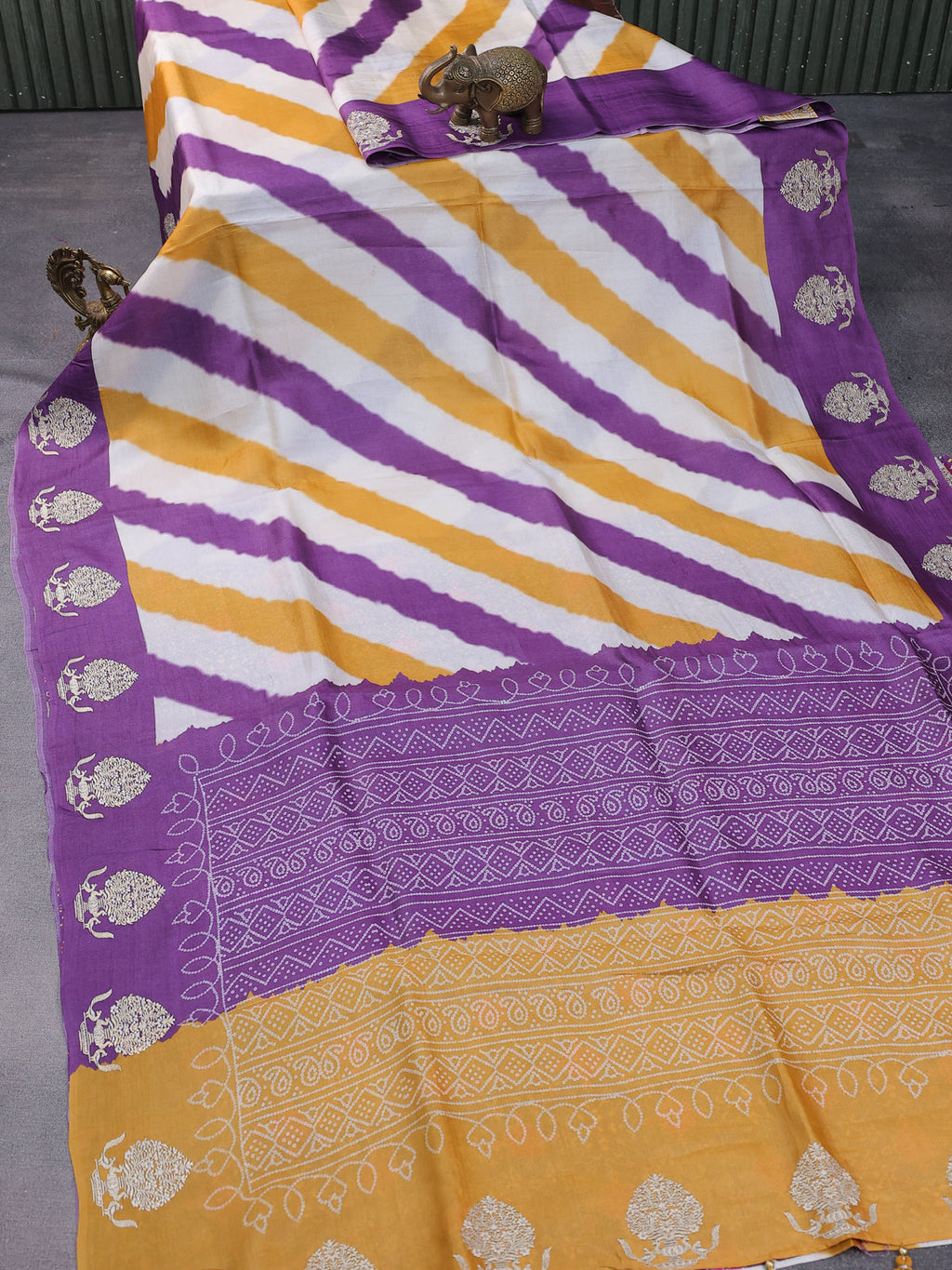 Beige Purple Yellow Tussar Silk Saree With Leheriya Design And Embroided Butta Border
