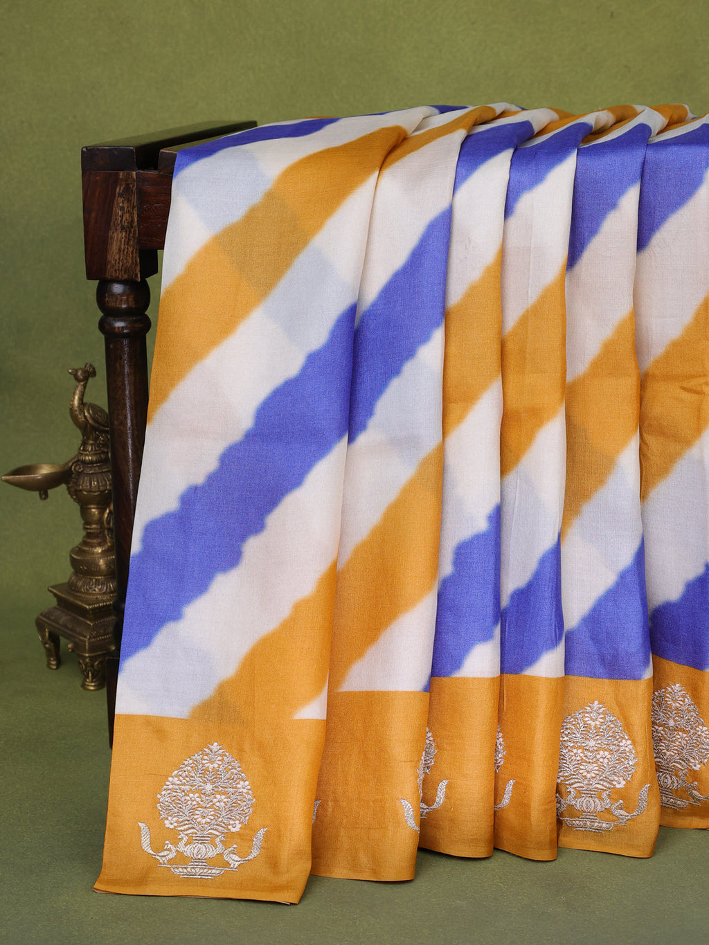 Beige Blue Yellow Tussar Silk Saree With Leheriya Design And Embroided Butta Border