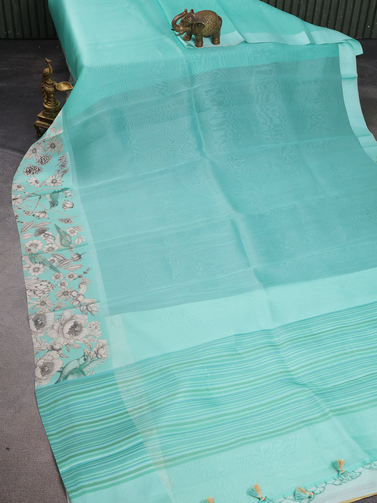 Teal Blue Banarasi Kora Saree With Plain Body And Satin Border Prints