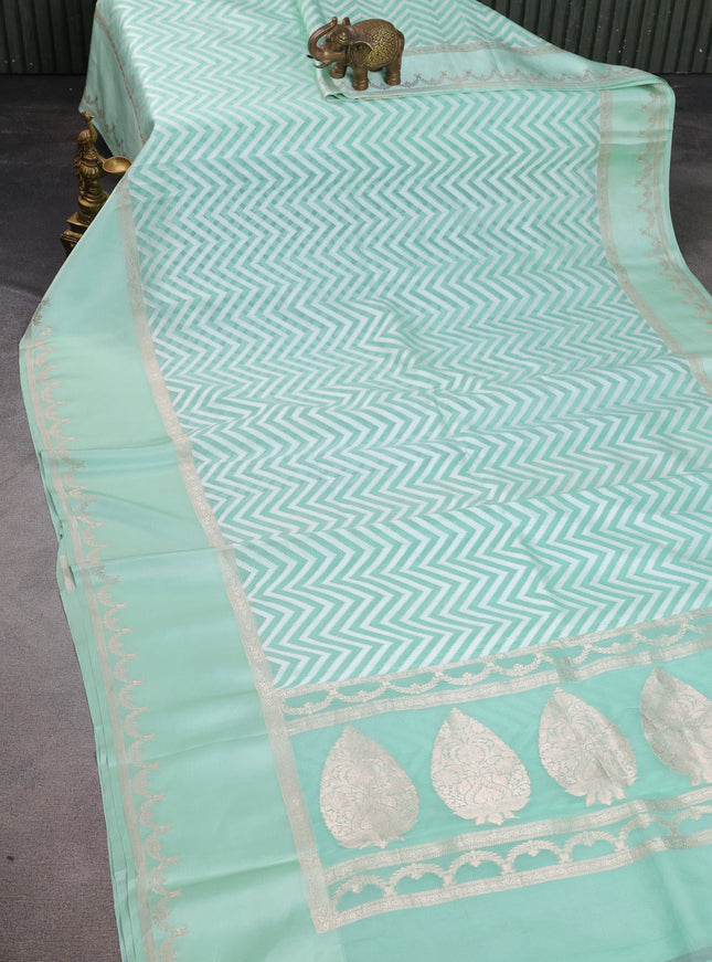 Teal Green Banarasi Kora Saree With Allover Thread Weaves And Satin Border