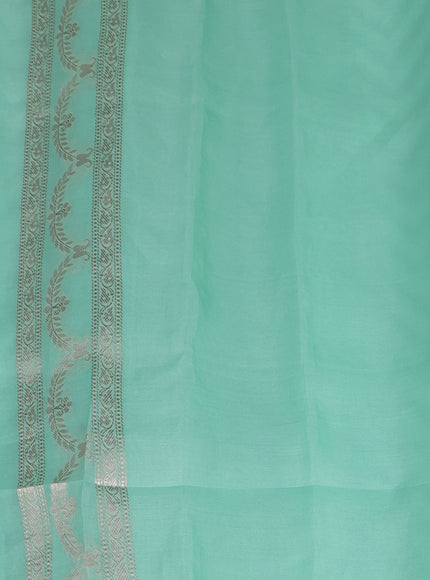 Teal Green Banarasi Kora Saree With Allover Thread Weaves And Satin Border