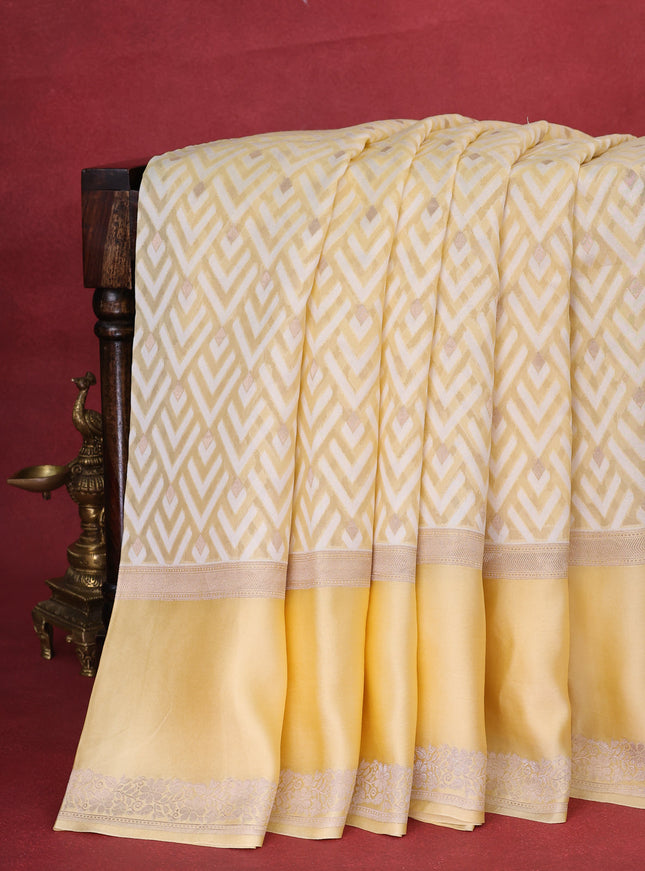 Pale Yellow Banarasi Kora Saree With Allover Thread Weaves And Satin Border
