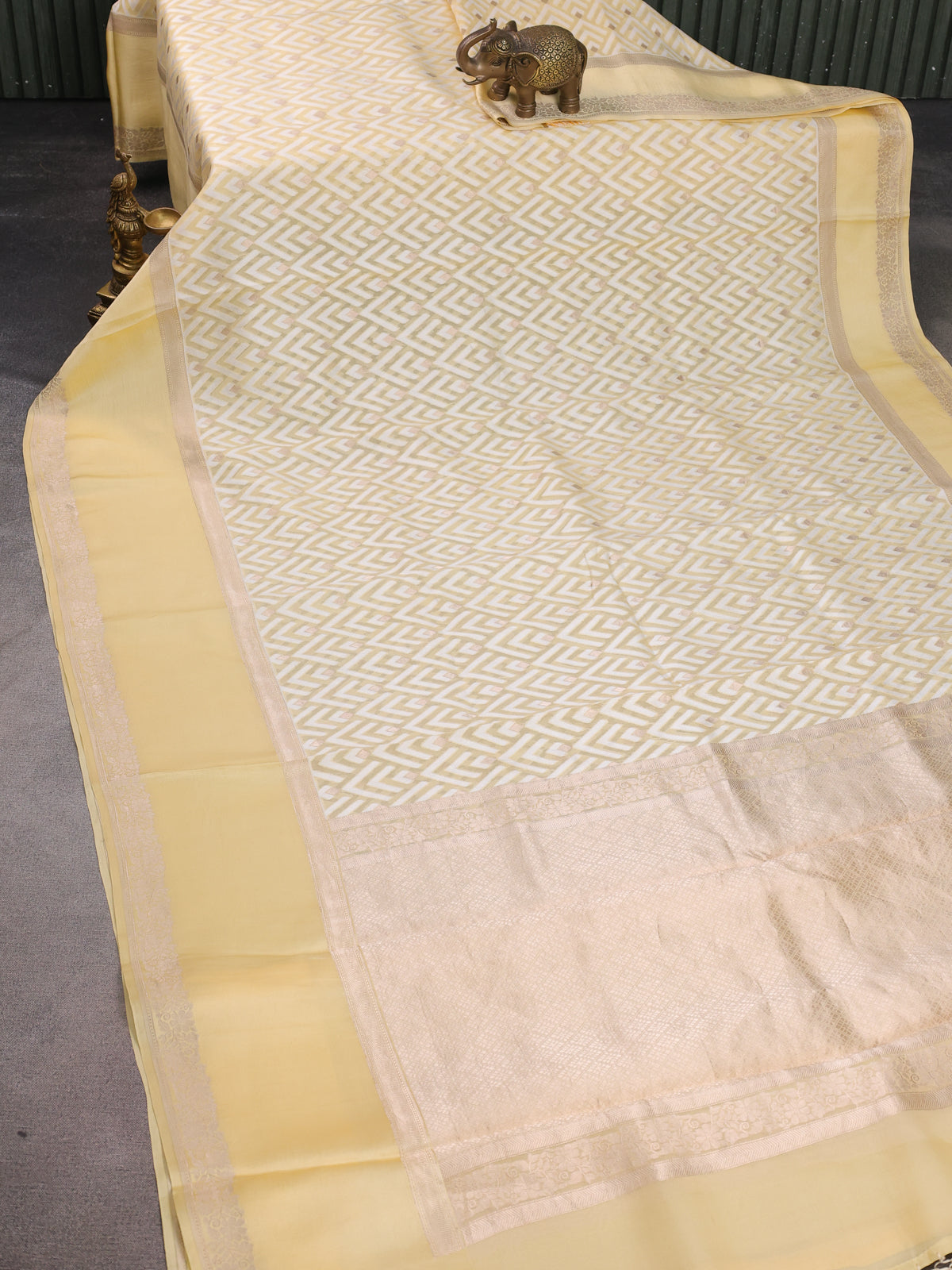 Pale Yellow Banarasi Kora Saree With Allover Thread Weaves And Satin Border