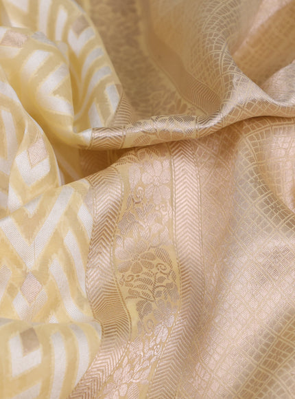 Pale Yellow Banarasi Kora Saree With Allover Thread Weaves And Satin Border