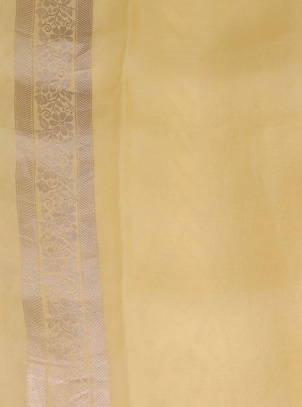 Pale Yellow Banarasi Kora Saree With Allover Thread Weaves And Satin Border