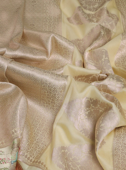Cream Banarasi Silk Saree With Allover Zari Weaves & Satin Border Prints