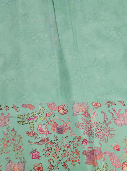 Pastel Green Banarasi Silk Saree With Allover Zari Weaves & Satin Border Prints