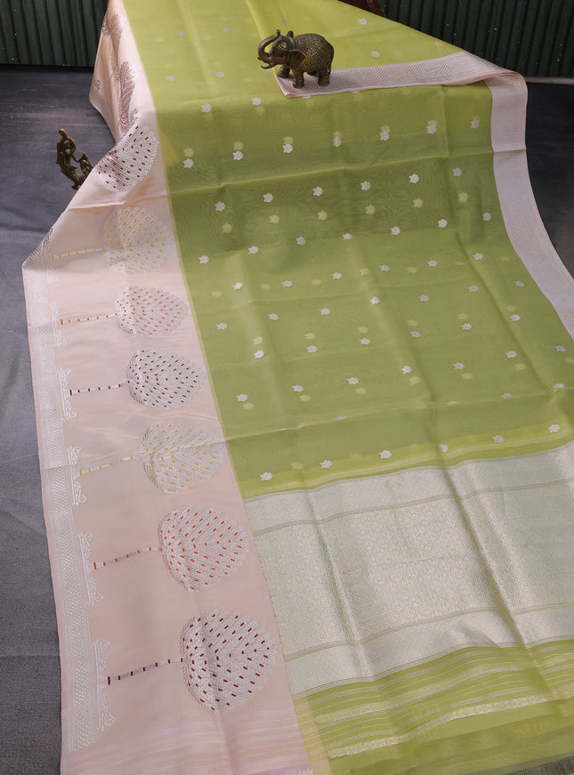Pista Green & Cream Banarasi Kora Saree With Zari Buttas & Long Rich Border