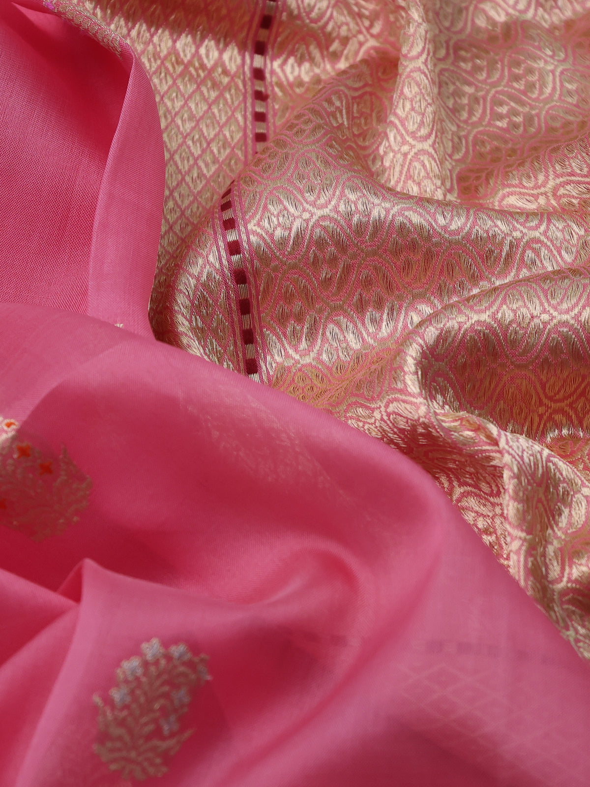 Light Pink Banarasi Kora Saree With Allover Zari Buttas & Rich Border