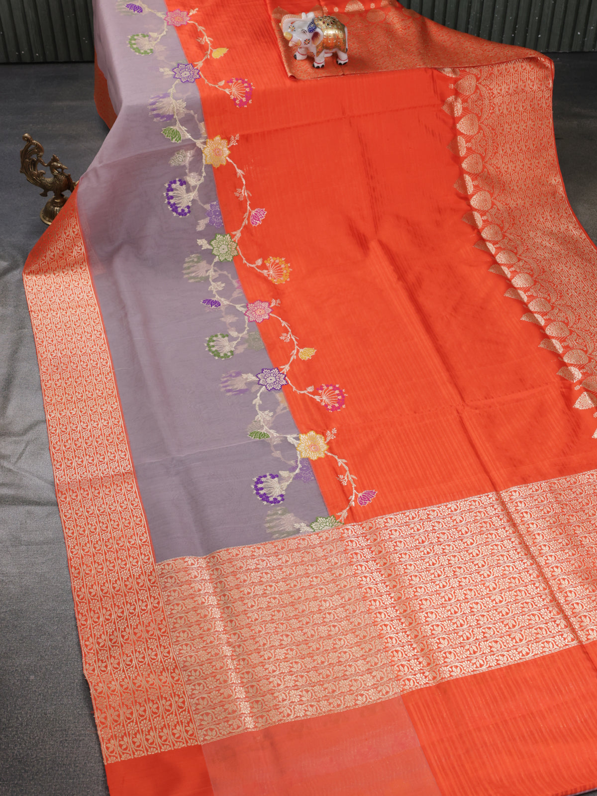 Orange- Grey Banarasi Silk Saree With Plain Body & Organza Floral Design Zari Border