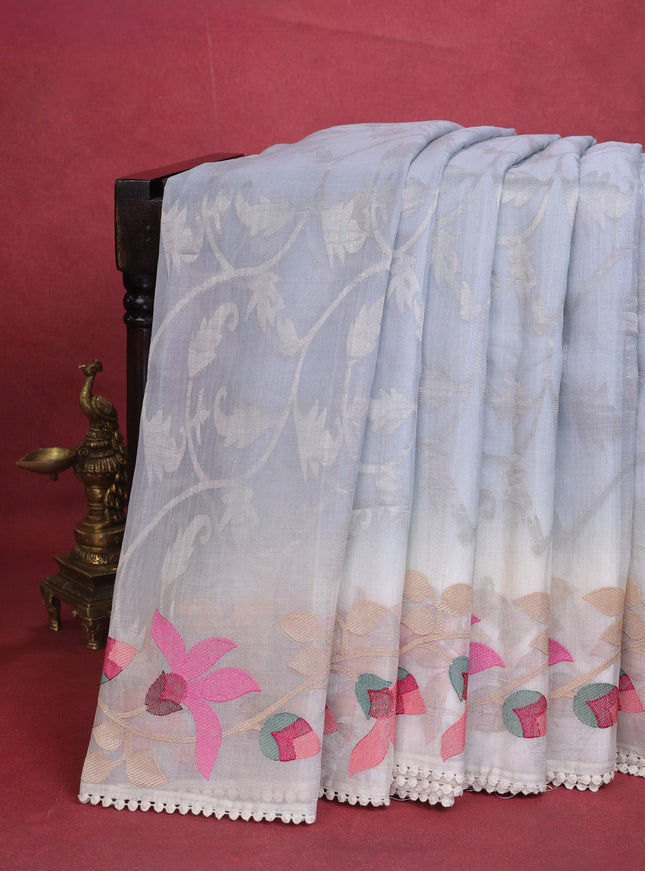 Pastel Grey-Cream Organza Silk Saree With Allover Silver Zari Weaves & Border Embroidery