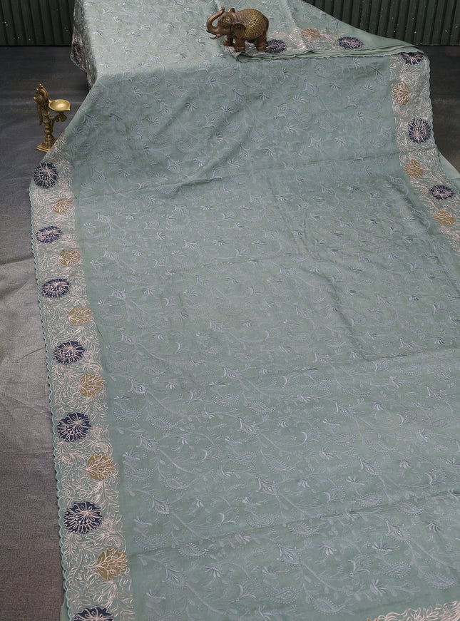 Greyish Green Tussar Embroidery Saree