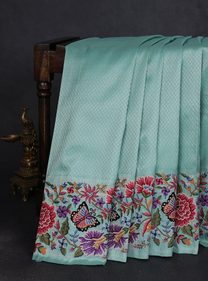Turquoise Blue Pure Kanchipuram Tissue Embroidery Silk Saree