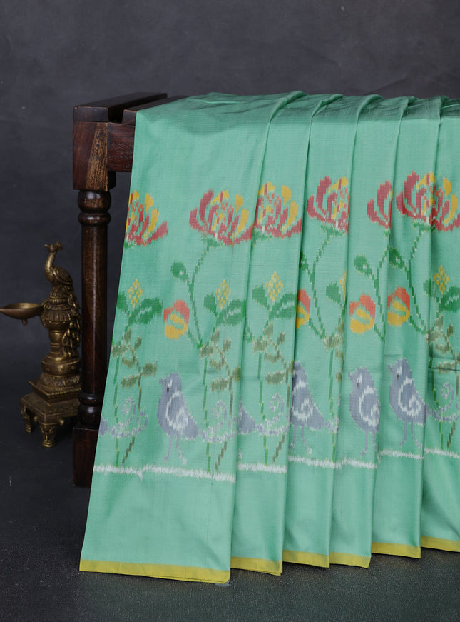 Teal Green Ikkat Silk Saree