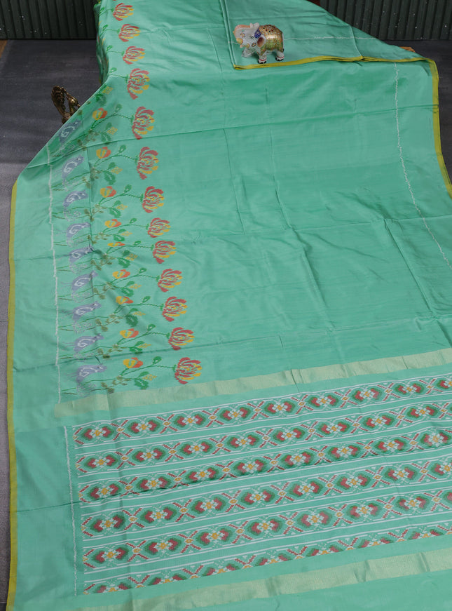 Teal Green Ikkat Silk Saree